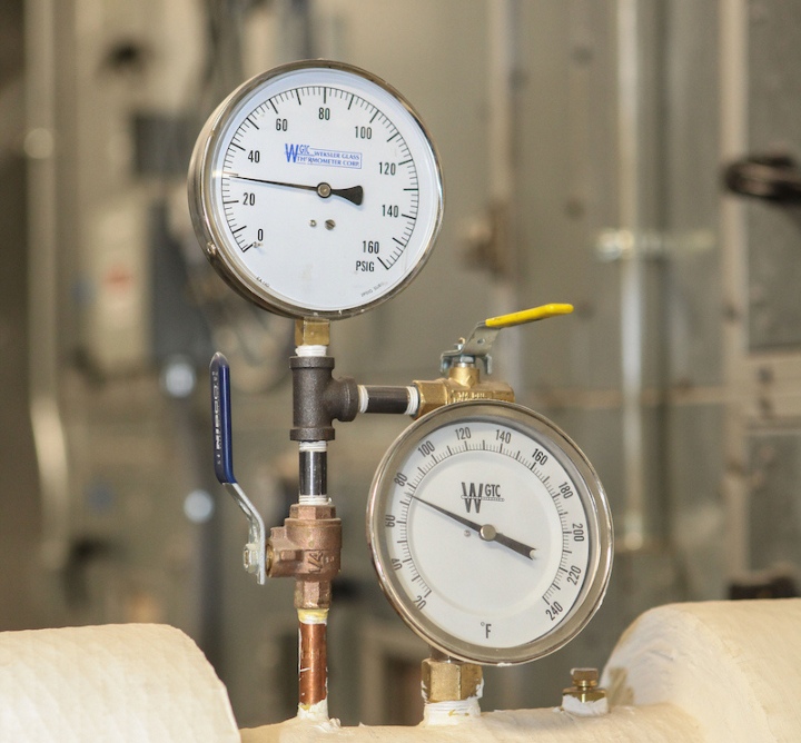 Measurement gauges on a mechanical unit.